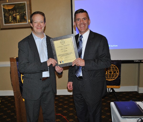 In October, Paul Reimers (r), chapter president, presents a Life Member certificate to Wes Nagel, a member of the chapter's board of directors.